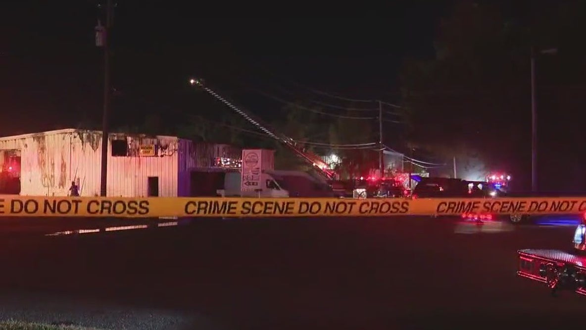 Firefighters battle large warehouse fire